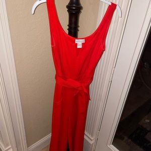 Orange Romper by the brand Apricot (Purchased from Ann Marie’s Boutique in FL)